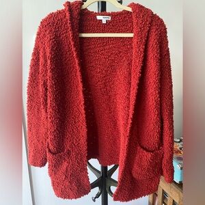 Red fuzzy hooded cardigan